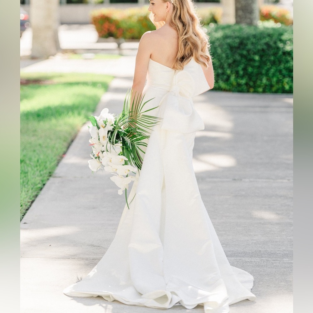 White bridal gown with removable bow